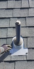 Somebody put a cap on this roof vent, causing the drain to gurgle and drain slowly.
