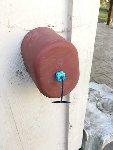 An outside faucet that will probably be damaged if it freezes.